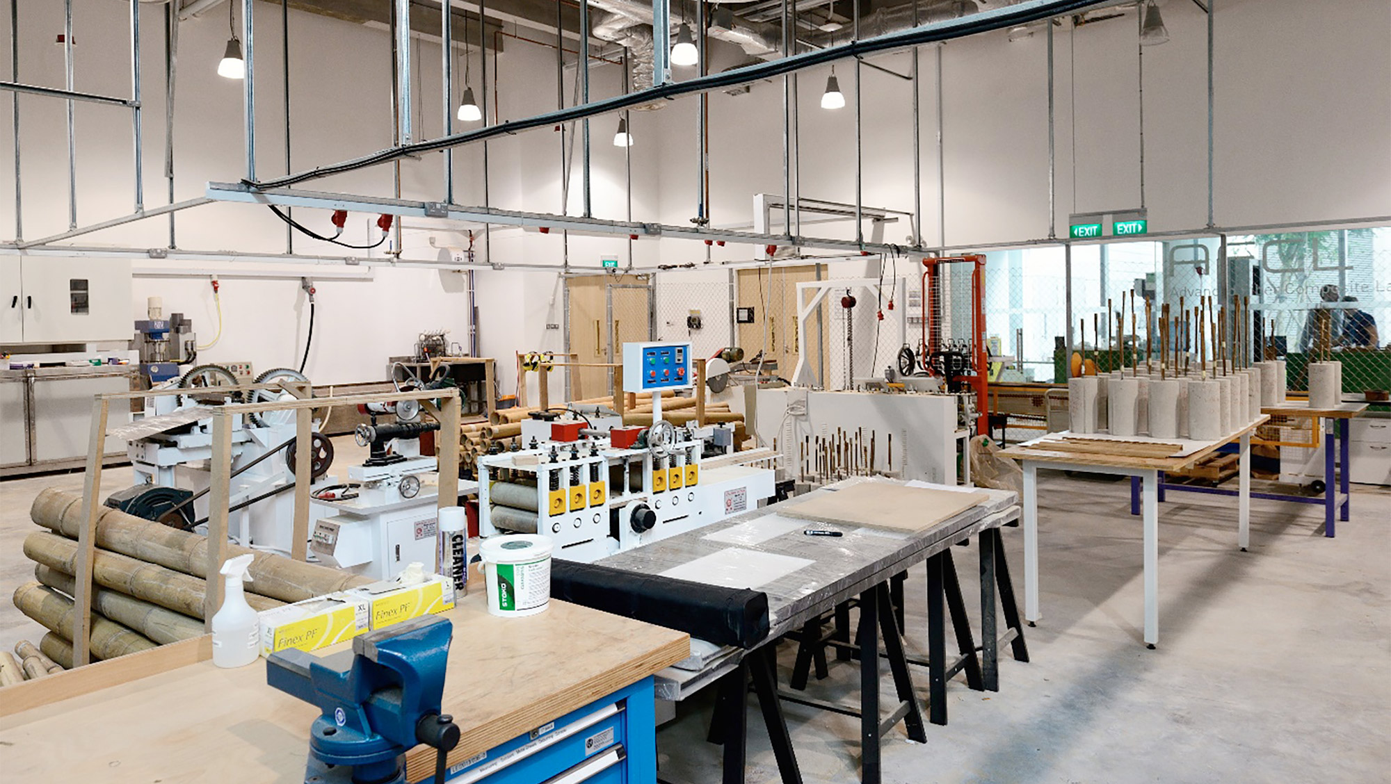 Workbenches and machinery in the bamboo laboratory.